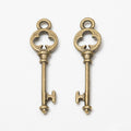 Clover Key Charm Slim Metal Pendant in Three Finishes view 2