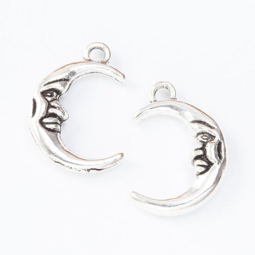 Front detail view of one pictured finish of moon face crescent charms