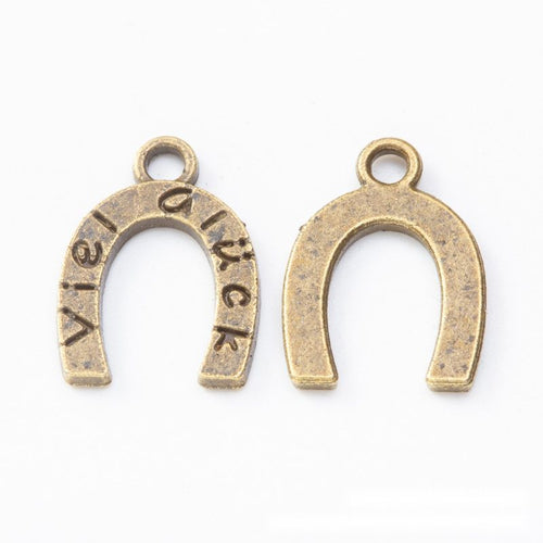 Close front and reverse view of the metal horseshoe charm