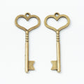 Heart Bow Key Pendant Charms in Antique Bronze and Silver view 2
