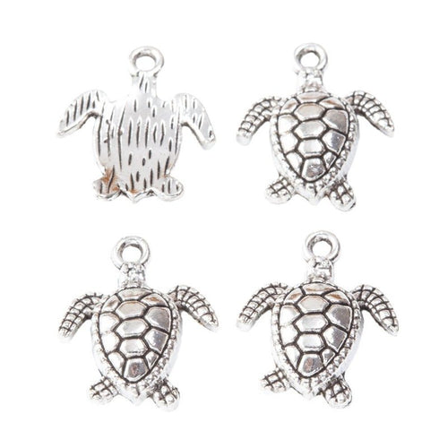 Close view of the sea turtle charm showing its raised front pattern