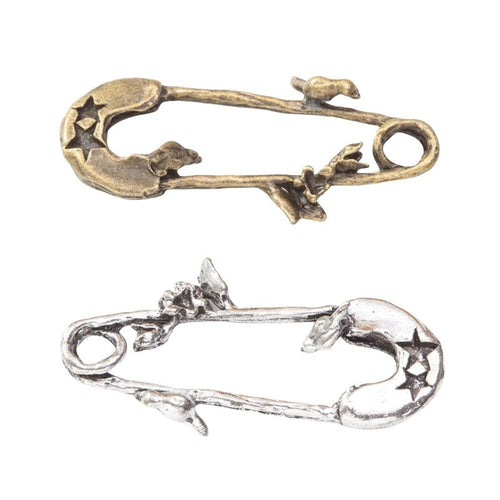 Close view of Moon and Stars Safety Pin metal shape and surface detail