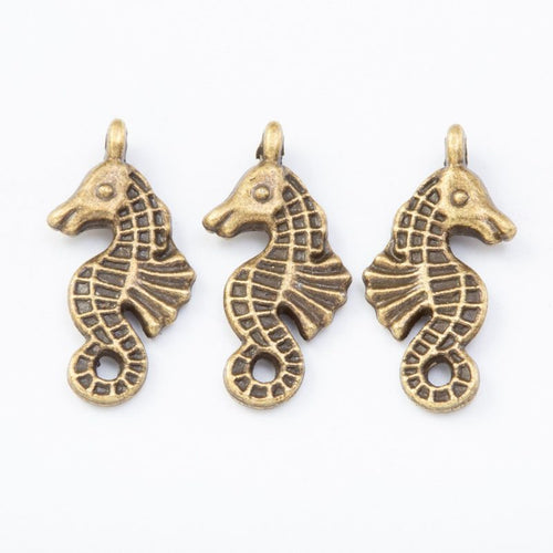 Close view of the seahorse charm showing its raised front pattern