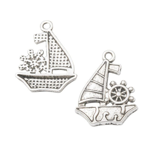 Close view showing the front details of the sailboat charms