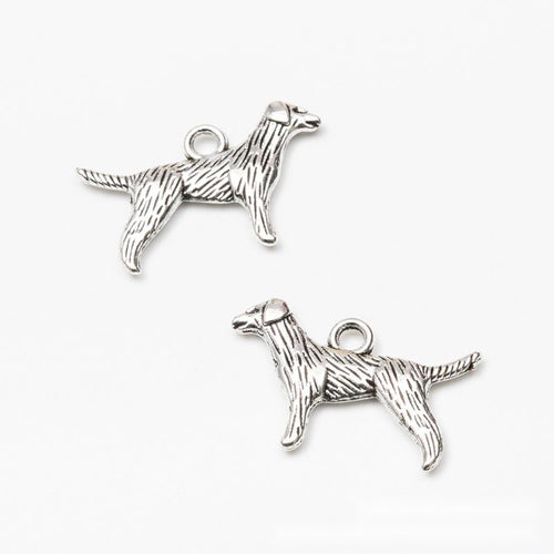 Alternate image of standing dog charm showing available finishes and form