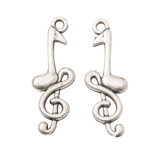 Detailed view of treble clef and note metal component