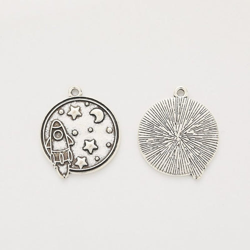 Rocket and Planet Charm front and reverse details on a white background