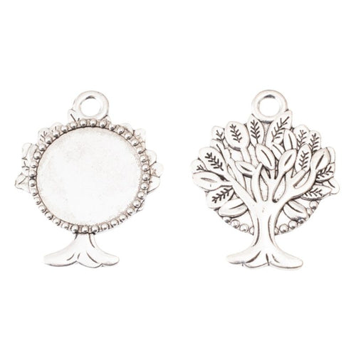 Close view of the a round recessed setting framed by beads and supported by a tree-like base