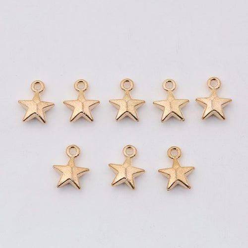 Close view of the solid five-point star showing a simple solid silhouette and round top loop