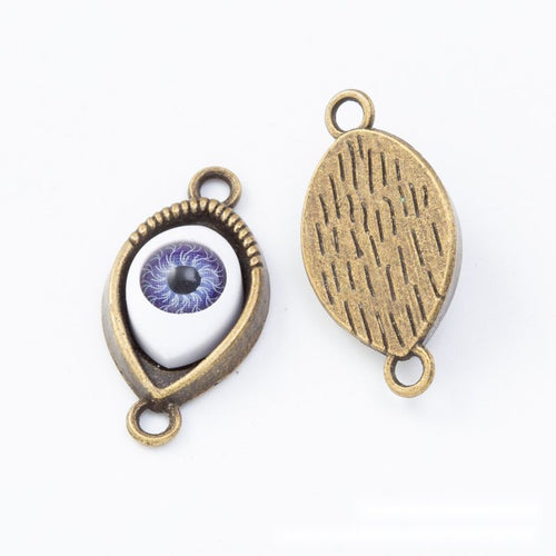 Close view of the front details on colorful evil eye teardrop pendants