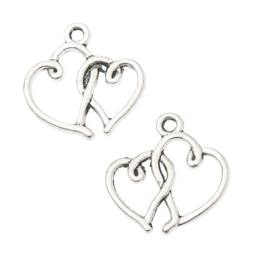 Front and reverse details of the interlocking double heart metal charm