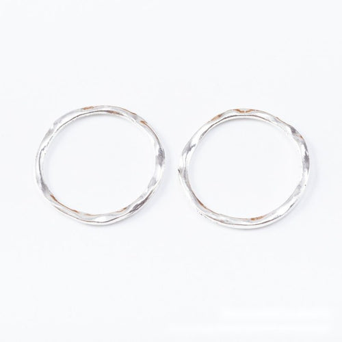 Close-up view of the hammered round open rings in four metallic finishes showing its front and reverse metal details.