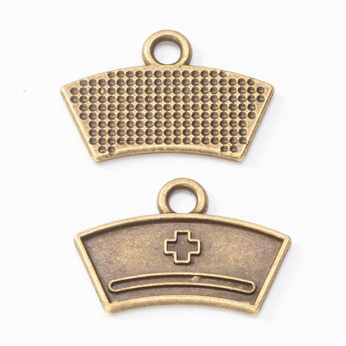 Nurse cap metal component, front and reverse detail on white