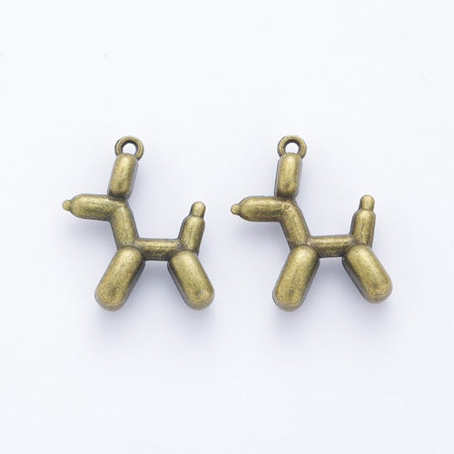 Close front and reverse view of the metal balloon dog charm