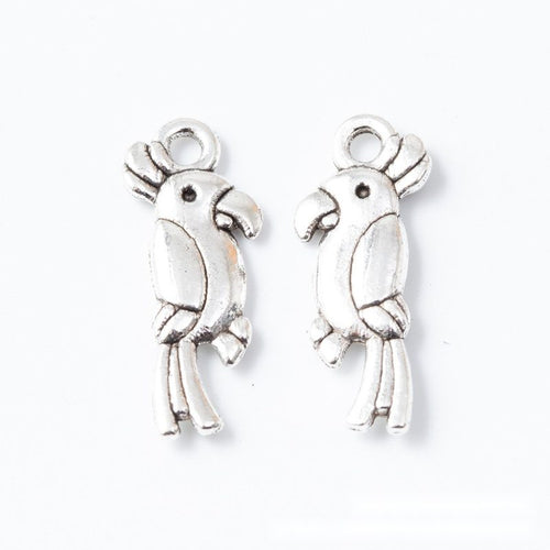 Long Tailed Bird Charm Pendant front detail showing a crested bird profile with a long split tail