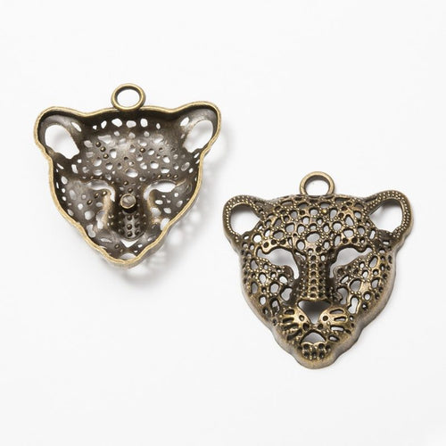Additional front and reverse view of the leopard head charm