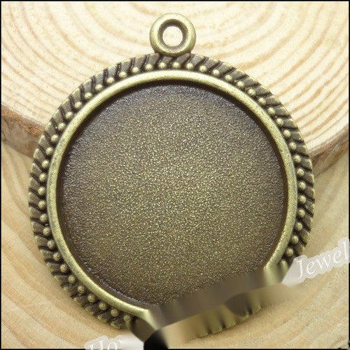 Round Beaded Cabochon Setting metal design front and back view on a light background