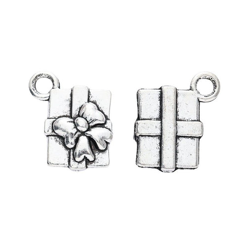 Close view of the gift box charm surface and relief
