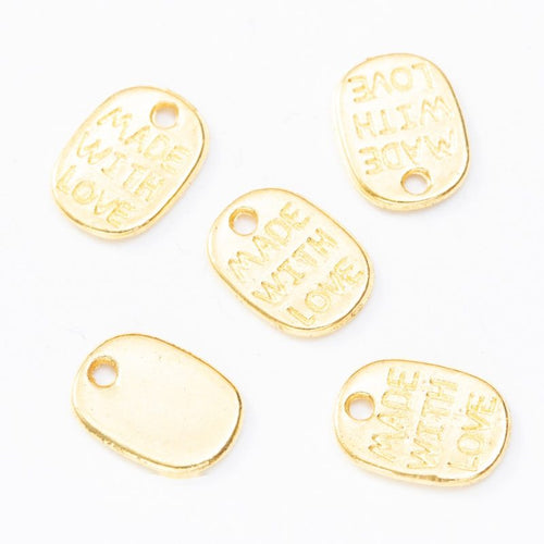 Antique Bronze, Gold Tone, Antique Silver made with love message charm shown in a detailed product view