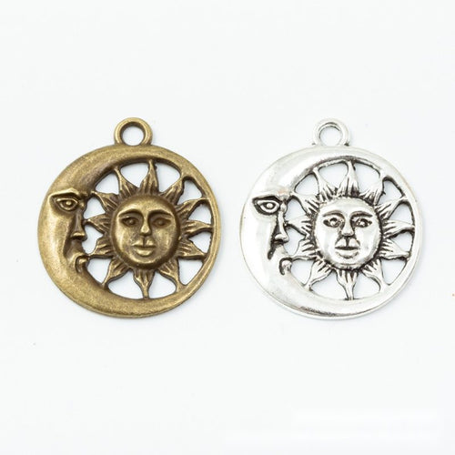 Additional front and reverse view of the sun and moon disc charm