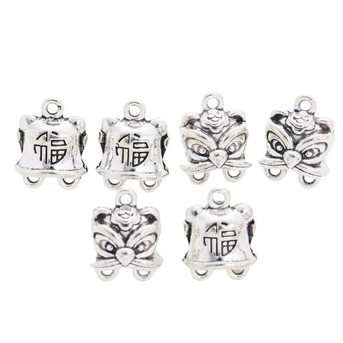 Grouped view of the fu character tiger hat connector charm from the front