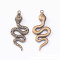 Double-Sided Coiled Snake Metal Charm in Two Antique Finishes view 2