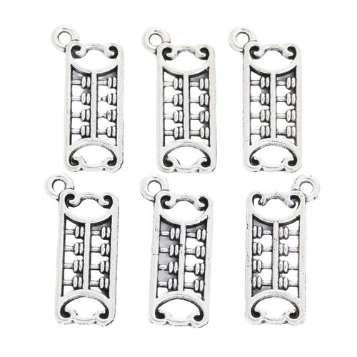 Grouped front and back views showing the details of long abacus charms