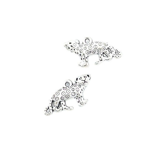 Front and reverse views of the tiny running leopard charm