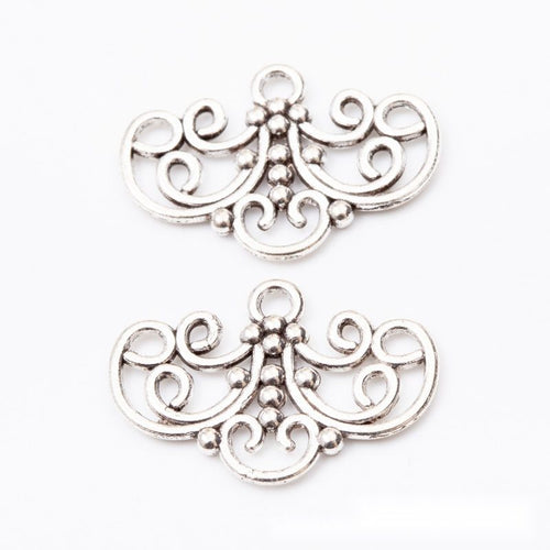 Product photo 2 of the scrollwork multi-loop bar connector highlighting its symmetrical scrollwork bar with side and low