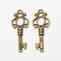 Ornate Crown Bow Key Metal Charm for Jewelry Making in Antique Bronze and Antique Silver view 2