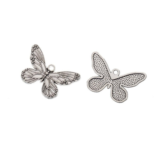 Close view showing the front and reverse details of the butterfly charm