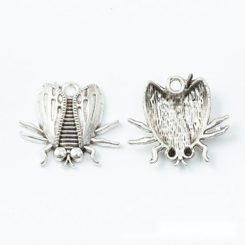 Assorted detailed beetle finishes arranged on a white background