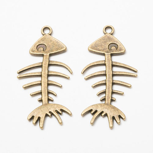 Ribbed Fish Skeleton metal piece showing front-facing surface and relief detail
