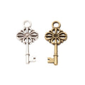 Ornate Floral Bow Key Charms in Two Antique Metal Finishes view 2