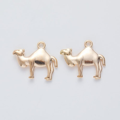 Close view of the front details on standing camel charm pendants
