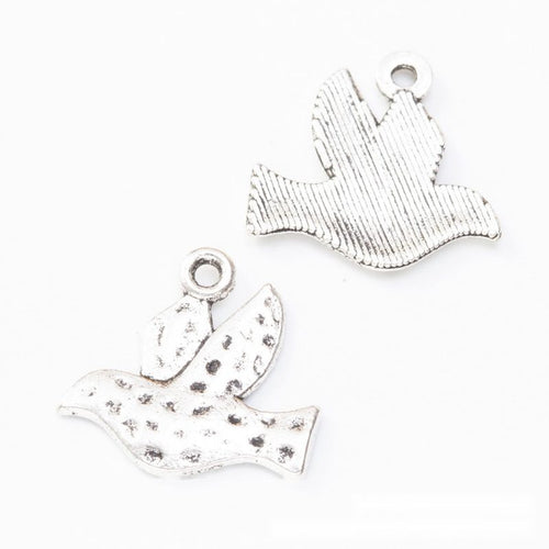 Detailed front and back view of 飞鸟 charm on a white background