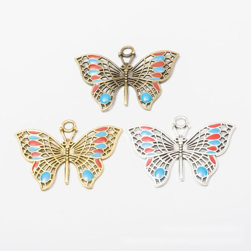 Alternate image of enamel butterfly pendant showing available finishes and form