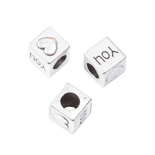 Close view of lettered cube bead