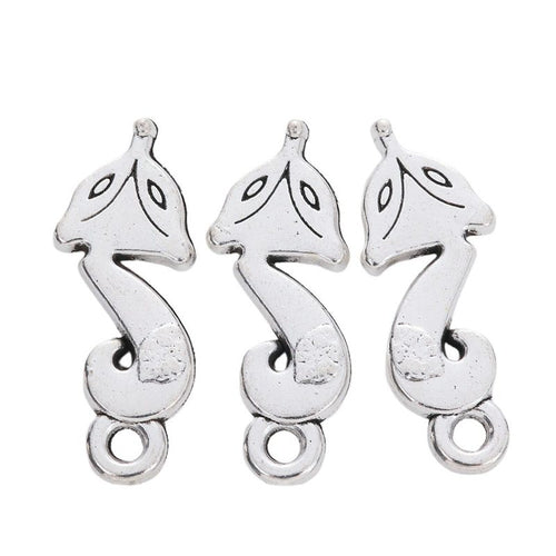 Grouped view of the two loop fox metal connector charm from the front