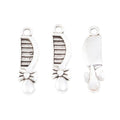 Bow Decorated Comb Charm Pendants in 2 Metal Finishes view 2