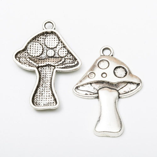 Mushroom charm shown in front and reverse details