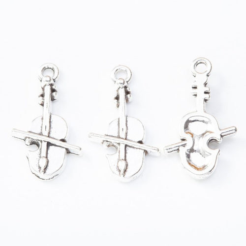Bowed string instrument metal component, front and reverse detail on white