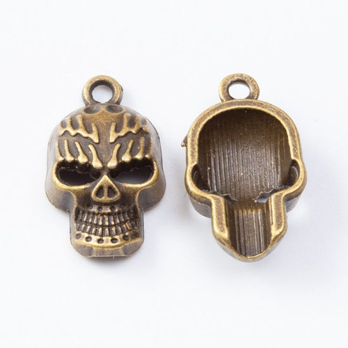 Front and reverse views of the flame skull in one finish