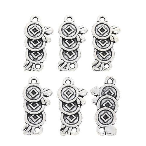 Grouped front and back views showing the details of stacked coin charms