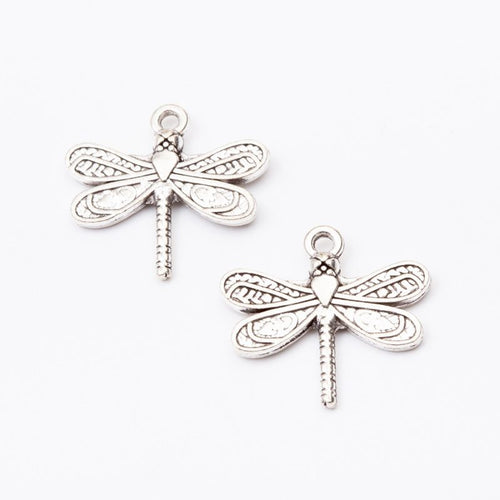 Close view of the front details on dragonfly charm pendants