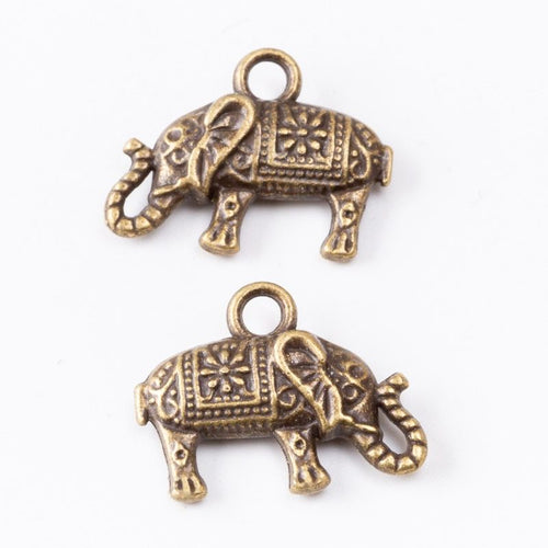 Closer view of the walking elephant profile with a patterned blanket