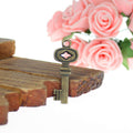 Pink Diamond Accent Key Alloy Pendant Charm in 3 Finishes view 1