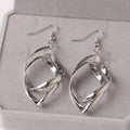Gold Silver and Gunmetal Twisted Ribbon Drop Earrings view 6