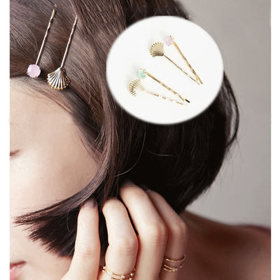Primary supplied view of shell and crystal-look hairpin sets