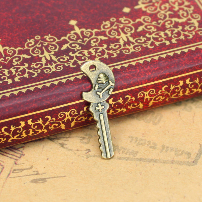 Small Skull Key Alloy Charm Pendant, Single-Sided, 25x9mm
